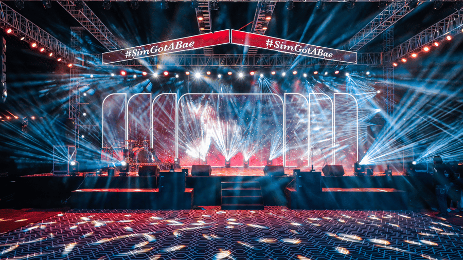 Illuminated stage with light beams and LED panels at Ananta Spa and Resorts, Jaipur.