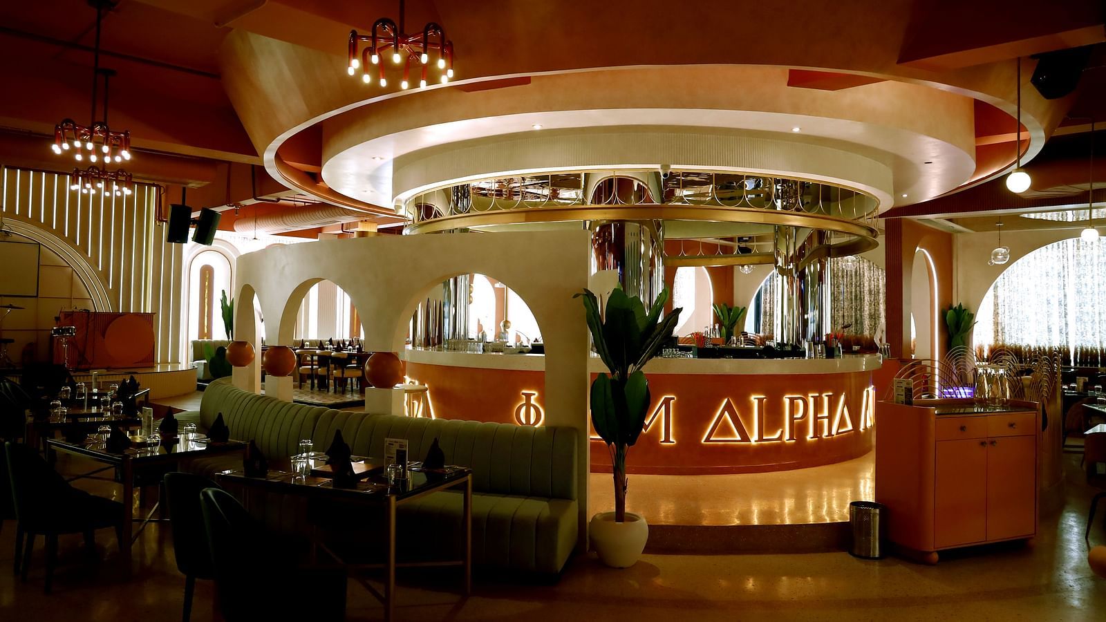 An image of a restaurant featuring seating area and a counter behind - Themis Barbecue House, Ambala