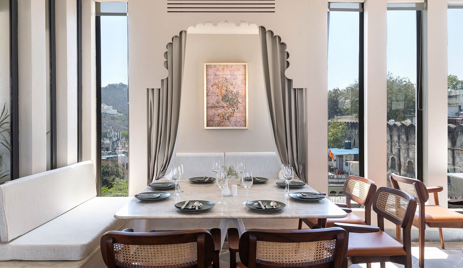 Seating arrangements inside a restaurant at Manuscript - Jhilwara Haveli, Udaipur
