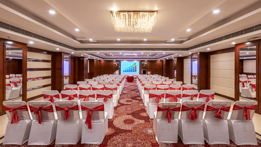 Chancellor hall with ample seating arrangement, bright lighting, carpet flooring and good audiovisual at Lords Plaza Jaipur.