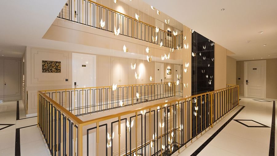 A view of well-lit interiors with golden lights | Renest Calangute, Goa