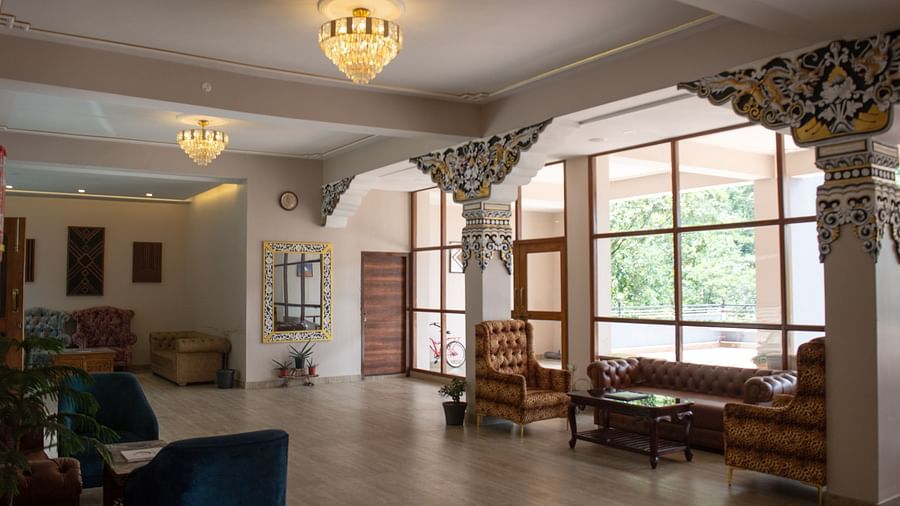 Reception and Lobby with seating area and chandeliers hanging from from the ceiling at  Avianna Ganagtok Resort and Spa