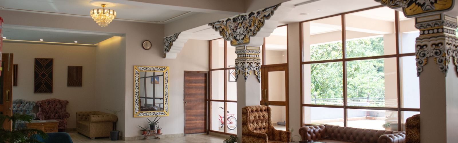 Reception and Lobby with seating area and chandeliers hanging from from the ceiling at  Avianna Ganagtok Resort and Spa