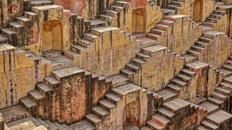 Traditional stepwell at Chand Baori, one of the tourist attractions near Jaipur