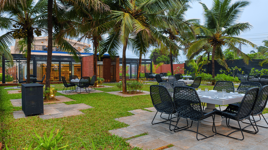 Seating arrangement at La Concha, an alfresco restaurant at Azaya Beach Resort Goa