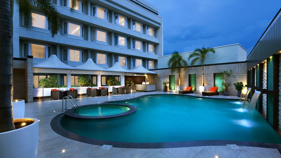 A nighttime view of the swimming pool | Cenneys Gateway