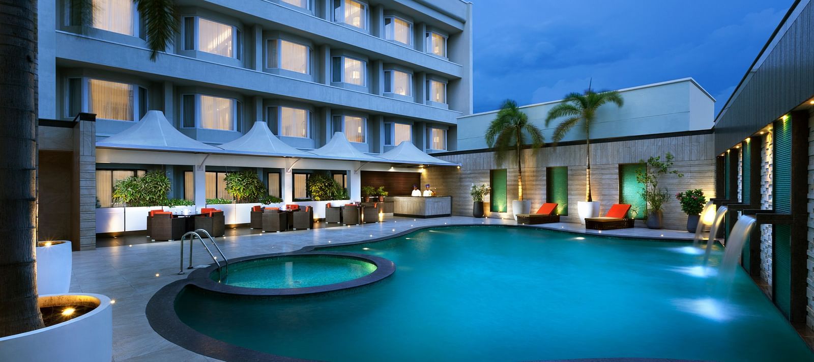 A nighttime view of the swimming pool | Cenneys Gateway