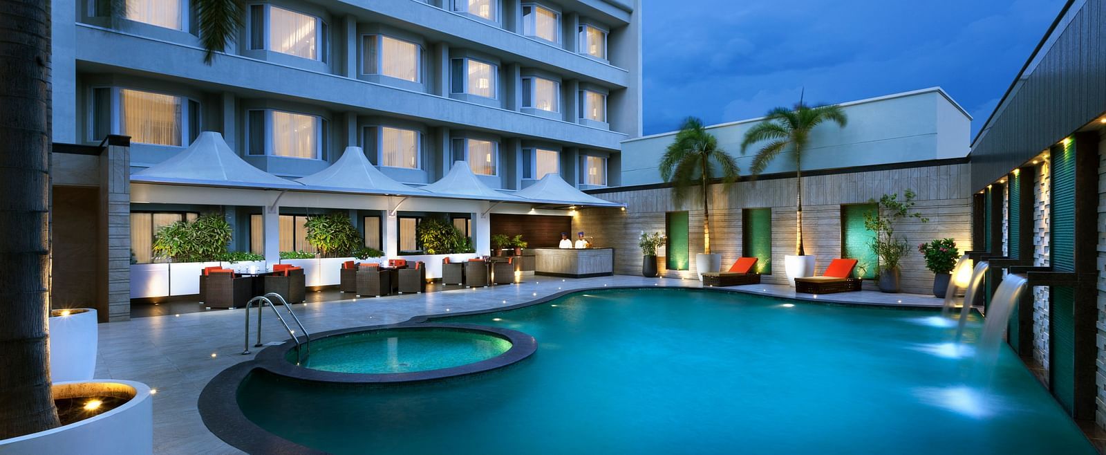 A nighttime view of the swimming pool | Cenneys Gateway