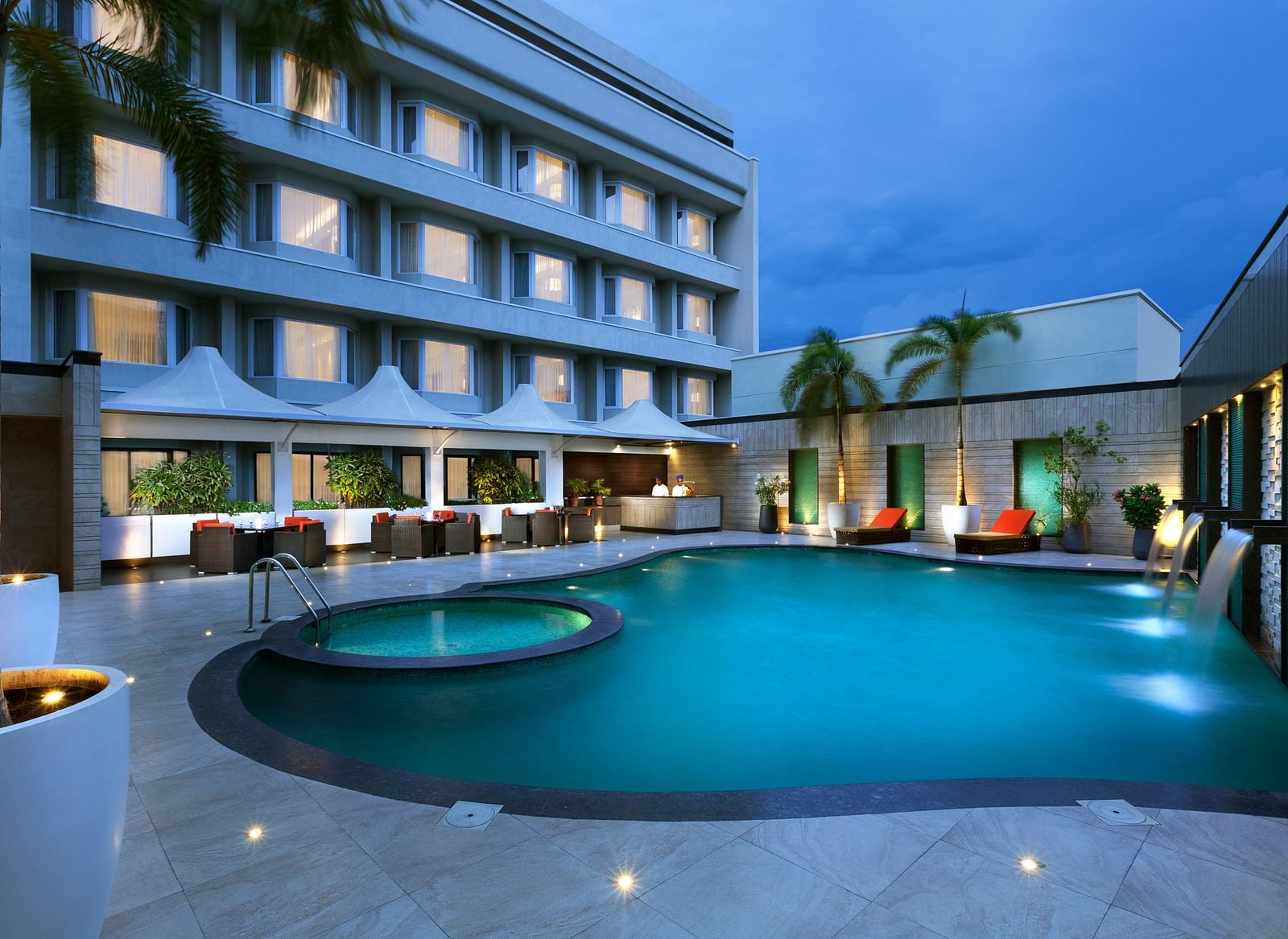A nighttime view of the swimming pool | Cenneys Gateway