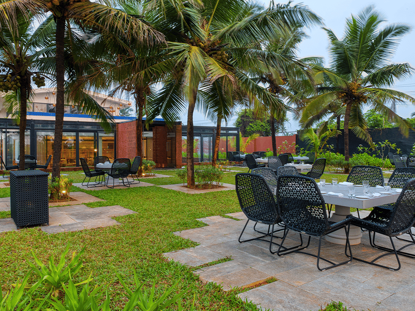 Seating arrangement at La Concha, an alfresco restaurant at Azaya Beach Resort Goa