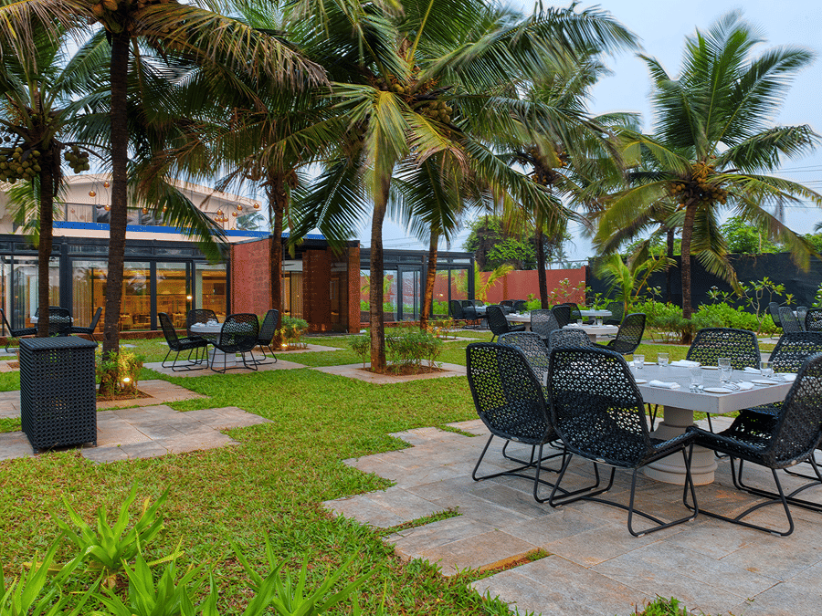 Seating arrangement at La Concha, an alfresco restaurant at Azaya Beach Resort Goa