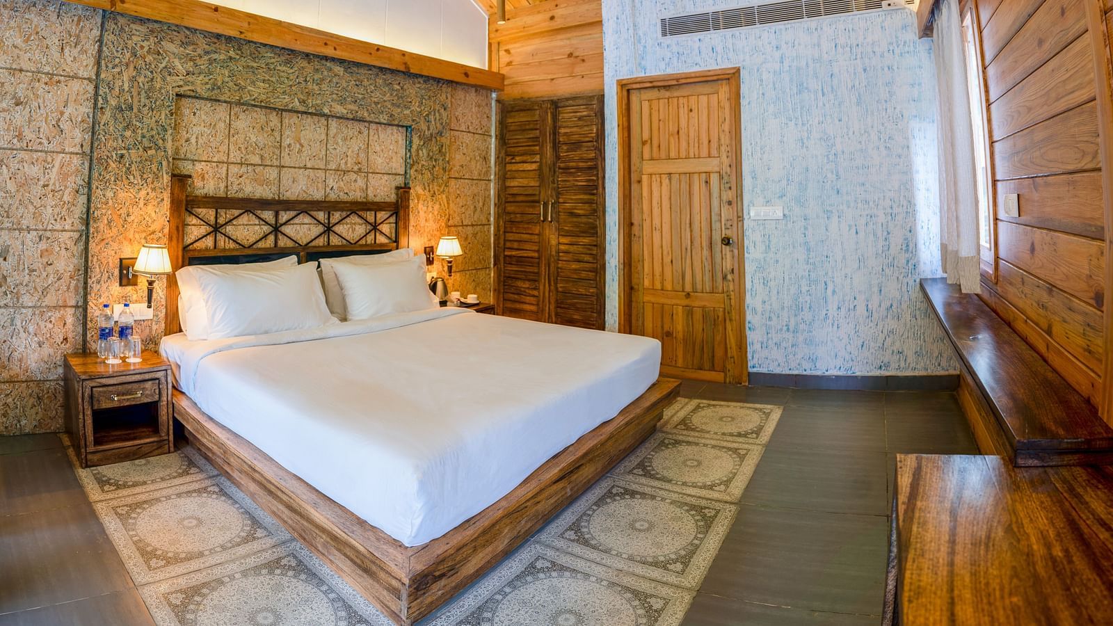 A large bed at Superior Room at the Sylvan Retreat, Dehradun.