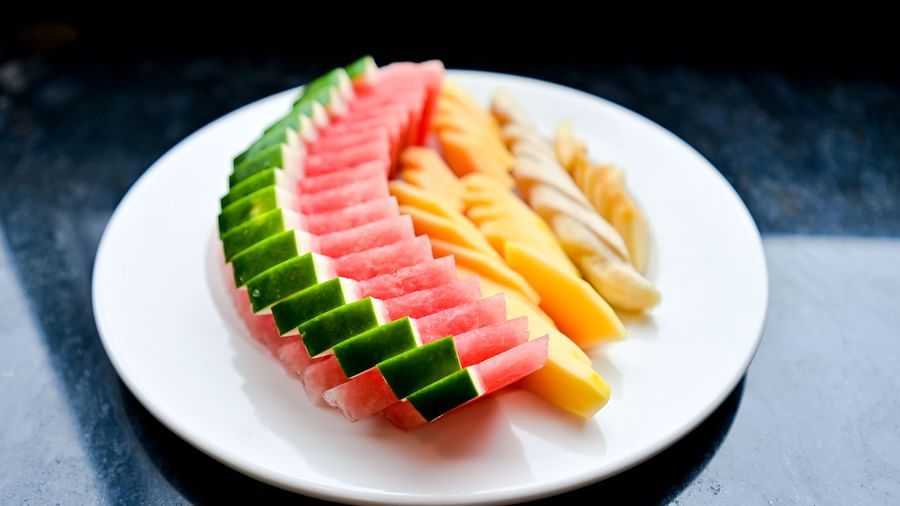 Fruit elegantly arranged on a plate at The Soma Hotel by Avianna Group, Darjeeling