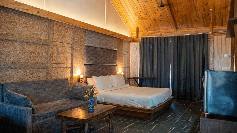 A view of the Master Suite with a large bed at the Sylvan Retreat, Dehradun.