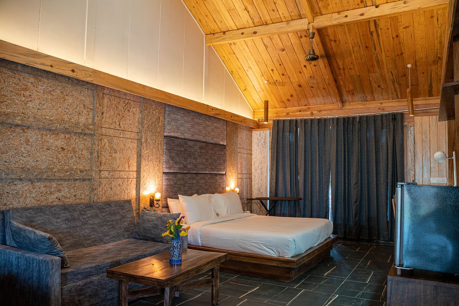 A view of the Master Suite with a large bed at the Sylvan Retreat, Dehradun.