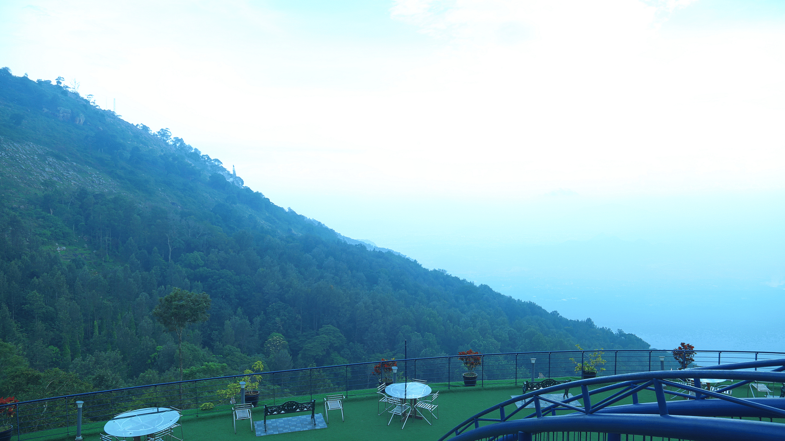 An image of the exterior view from the hotel showcasing the serene mountains - Great Trails Yercaud by GRT Hotels