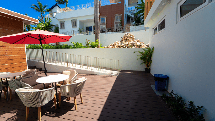 An image of an outdoor smoking area with canopies to protect from the sun - Hotel 39, Jamaica (Montego Bay)