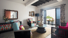 living room of Penthouse in Owl and the Pussycat Hotel