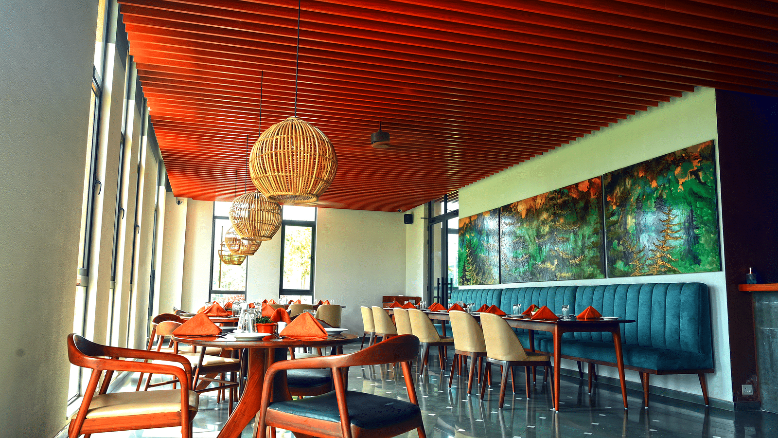 Silver Fir restaurant at Singalila Club with wooden ceilings and table arrangement