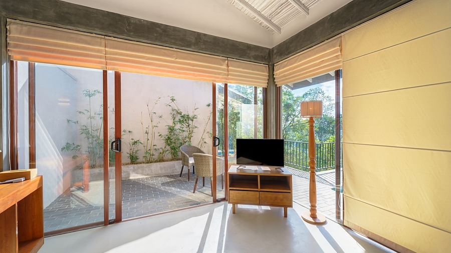 A TV in a corner of a room | Celestial Hills, Villas & Suites, Kandy