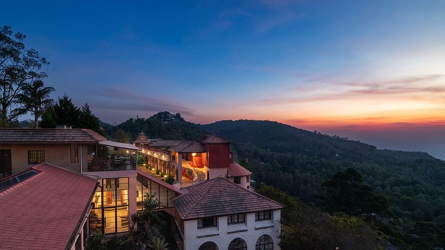 An evening view of a property which has many villas | Mango Hill, Yercaud