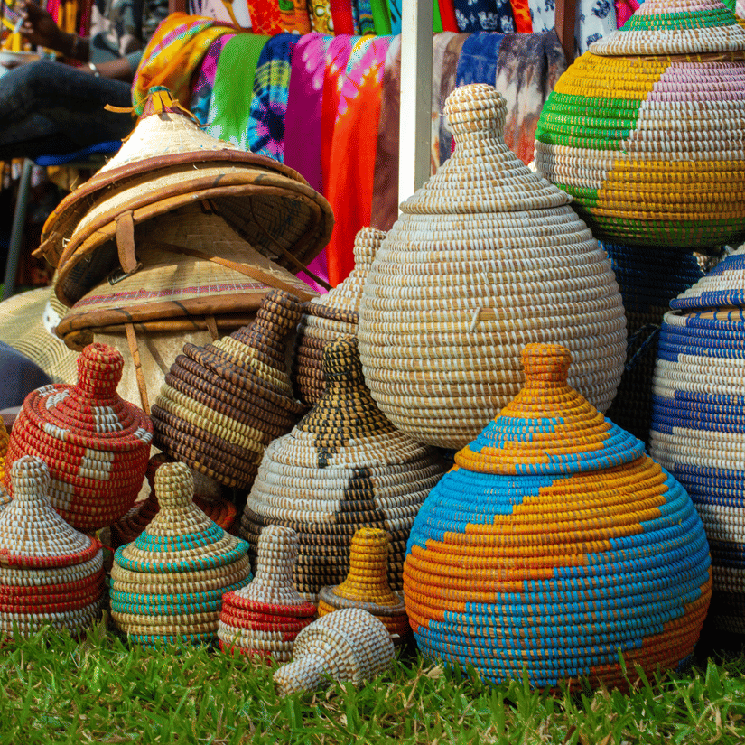Traditional woven Ethiopian baskets and colourful lidded containers displayed at a market stall