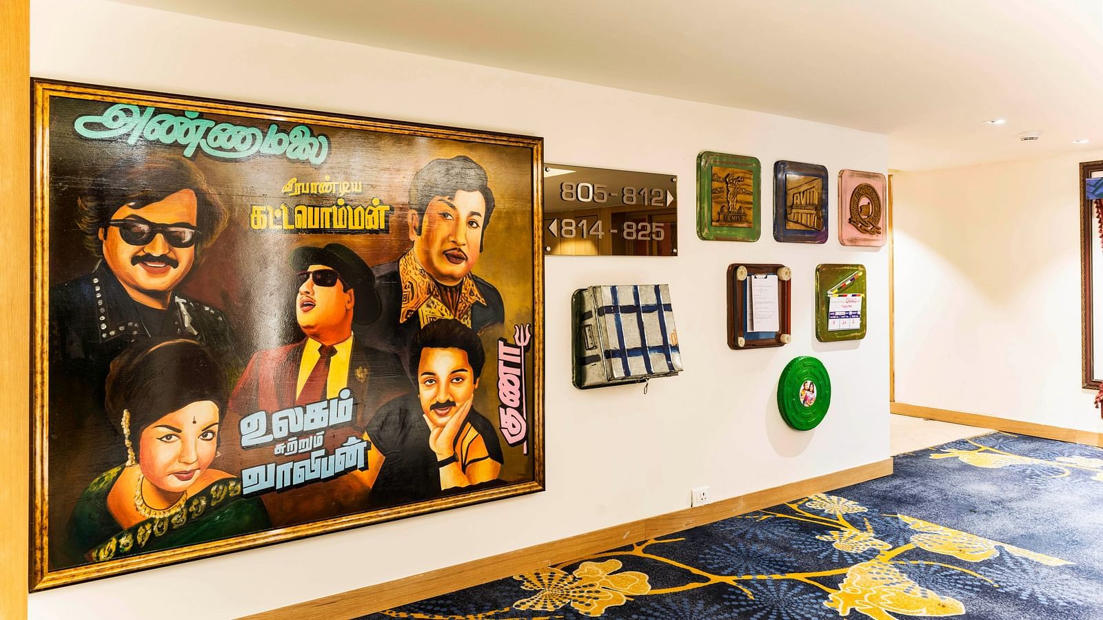 Wall with paintings displayed at Grand Chennai By GRT Hotels.