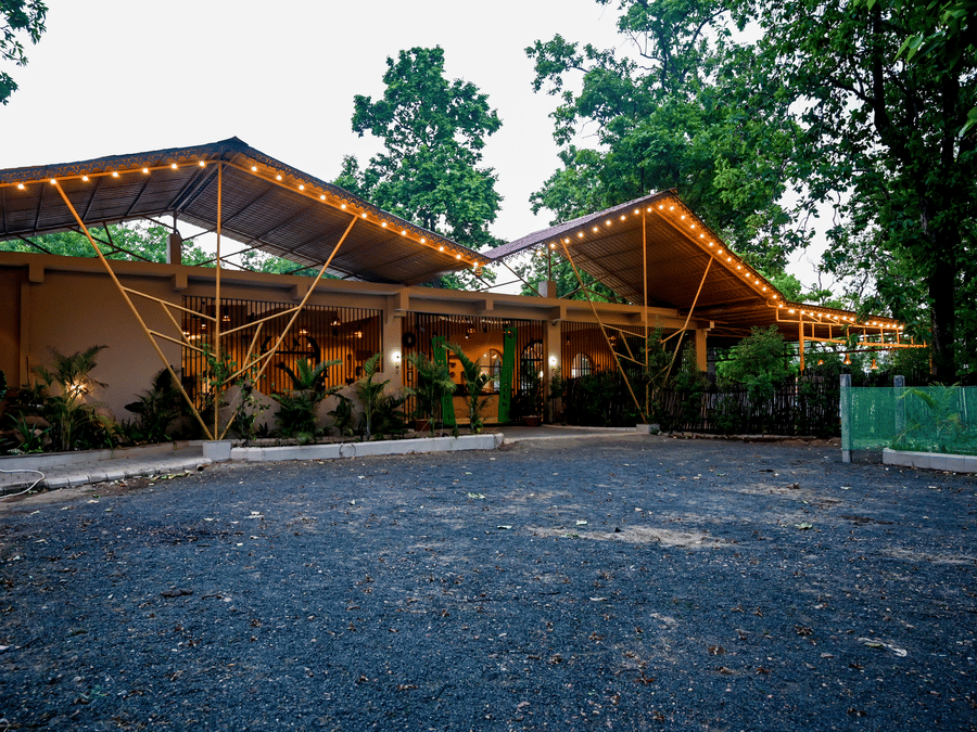 Evening seating beside the pavilion at Signum Resort, Bandhavgarh