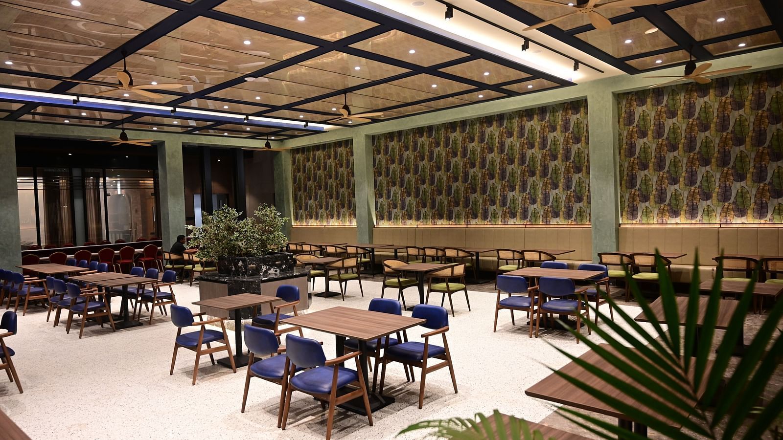 corner view image of the citrus restaurant and cafe with well arranged seating area