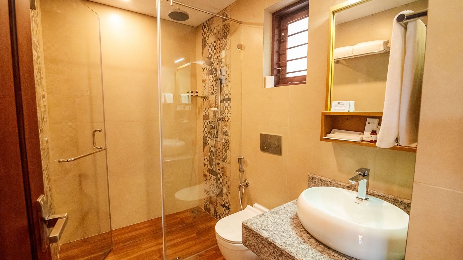 Modern bathroom with a sink and mirror in a luxury resort villa.