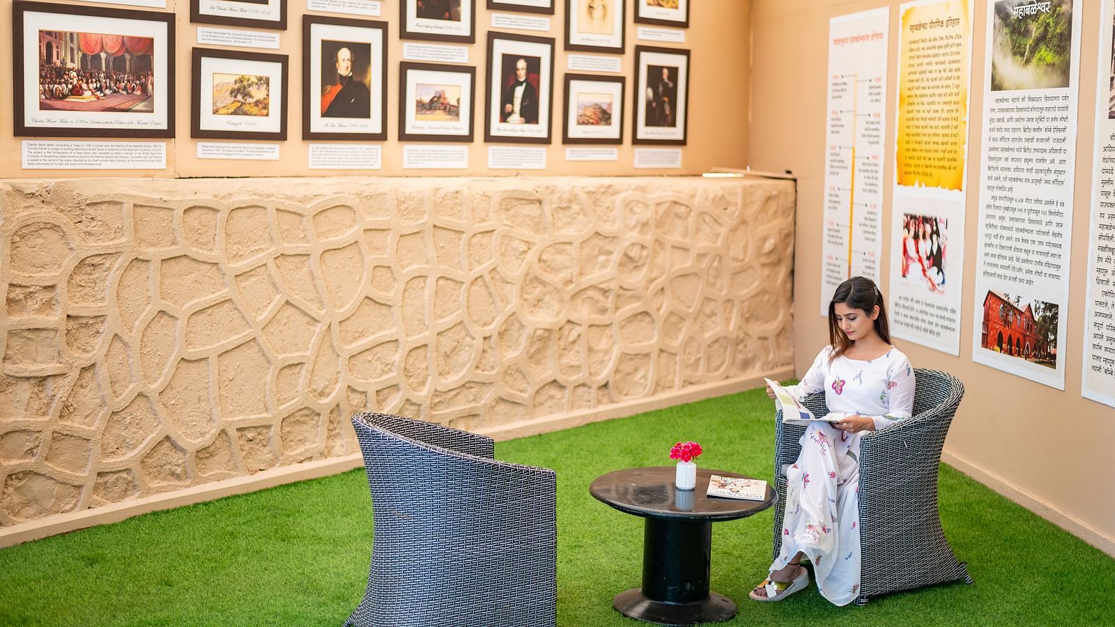  Guest relaxing with a book in the reading lounge at The Grand Legacy Resort and Spa.