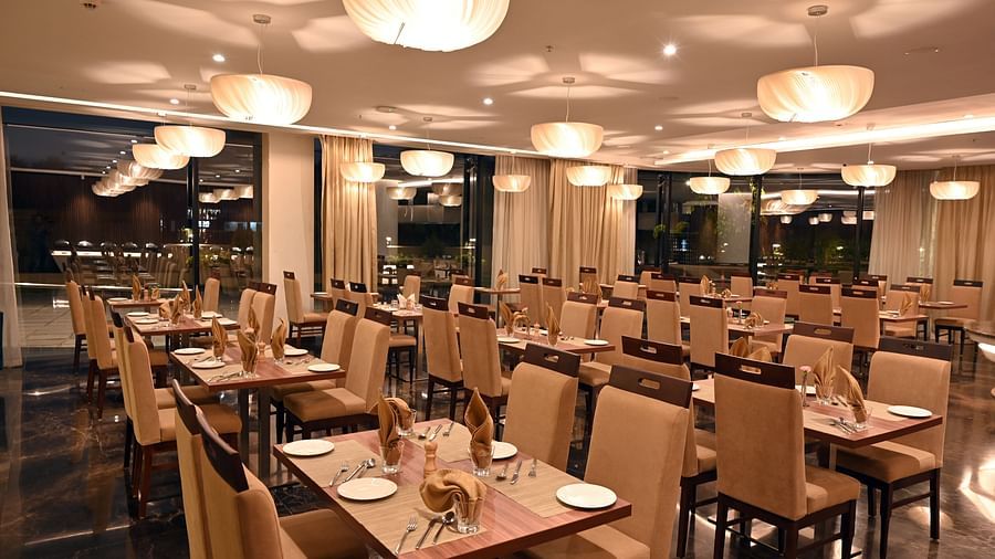 sitting area at the multi-cuisine restaurant in Calicut at Hive 3