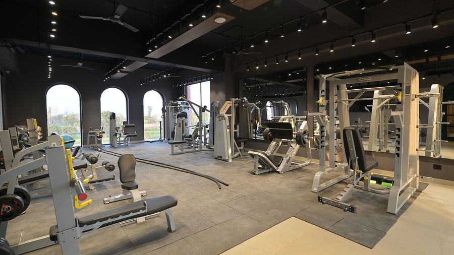 The interior of a gym with various weightlifting machines and equipment. - Clarks Safari Haridwar