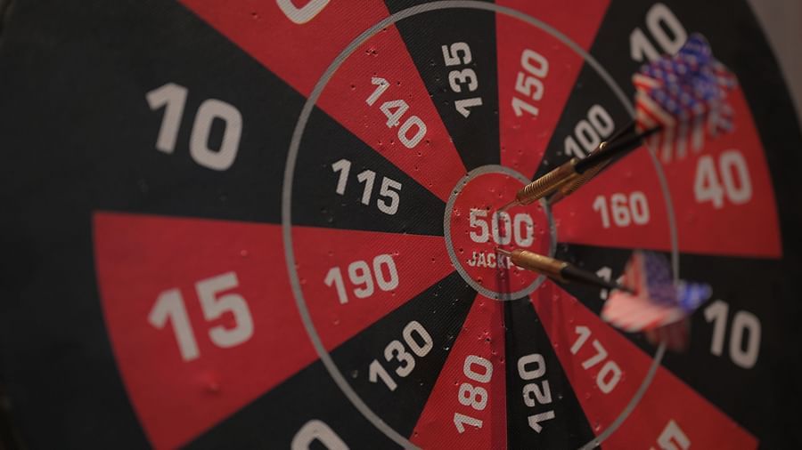 A close-up shot of a dart board with two darts stuck on the bull’s eye 500 pointer - Clarks Safari, Haridwar