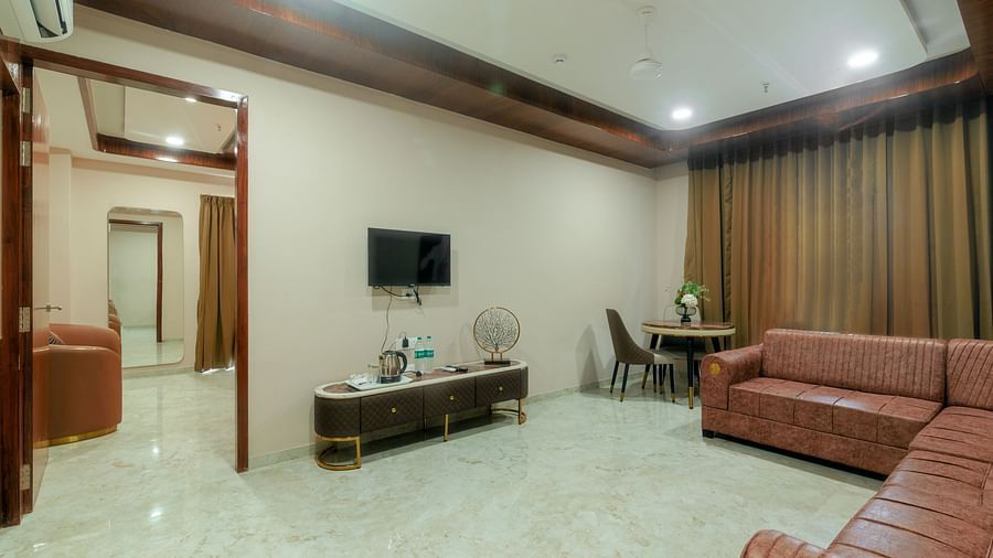 Overview of the living room inside the suite - VITS Satyajeet Karad