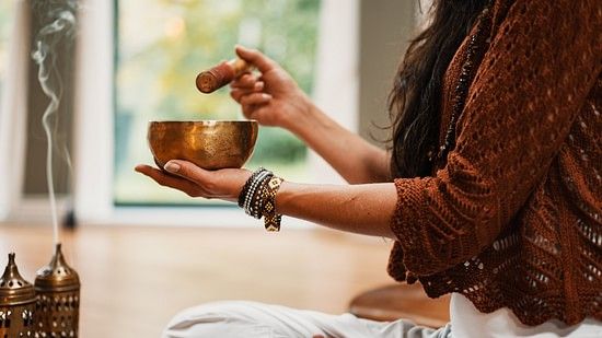 a woman performing a meditation ritual
