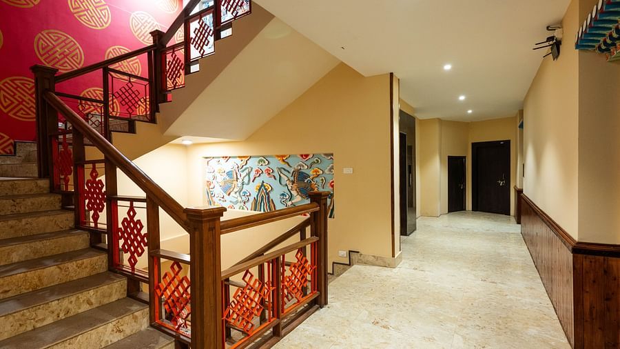 A view of a staircase and corridors, showcasing architecture at Avianna Hungry Jack, Gangtok.