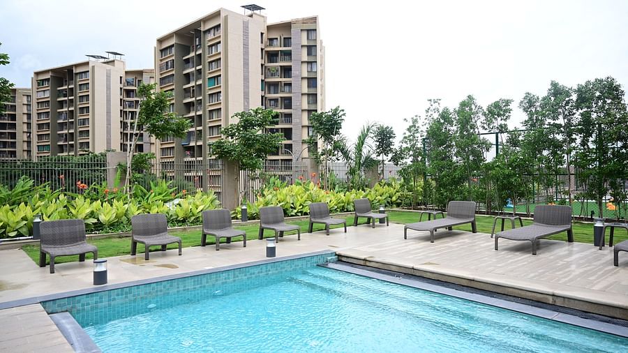 image of the swimming pool taken from a higher level at club charholi, pune