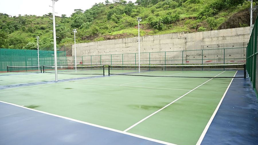 image of the tennis court from the corner at club charholi, pune