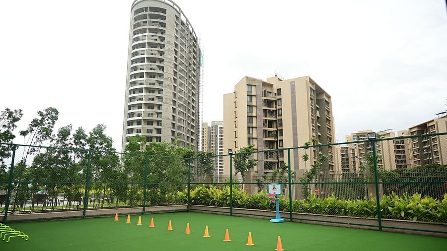 image of various cones lined up in the outdoor play area for kids at club charholi, pune