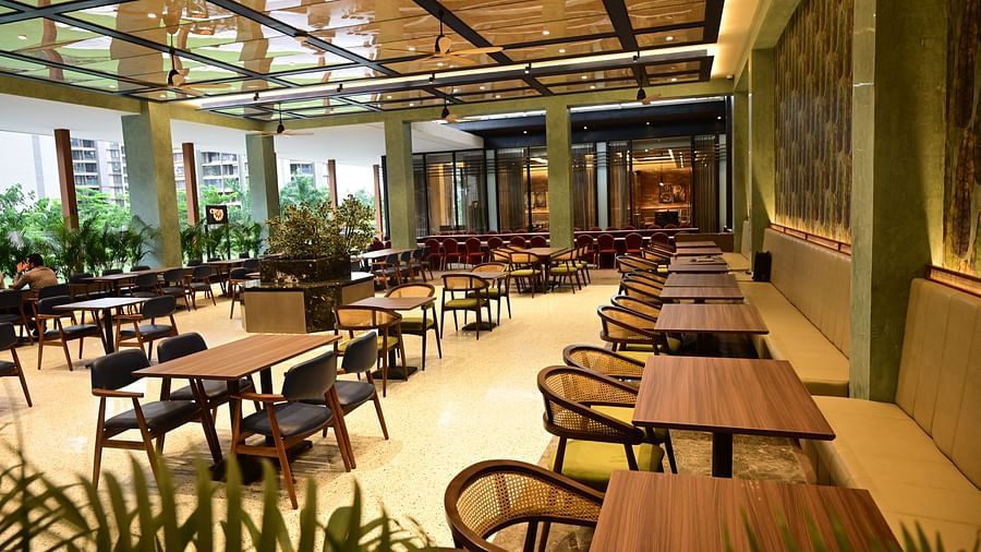 image of the dining area of Citrus Restaurant and cafe at club charholi, pune