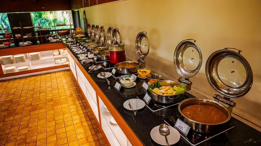 Breakfast buffet spread at a resort with a variety of dishes.