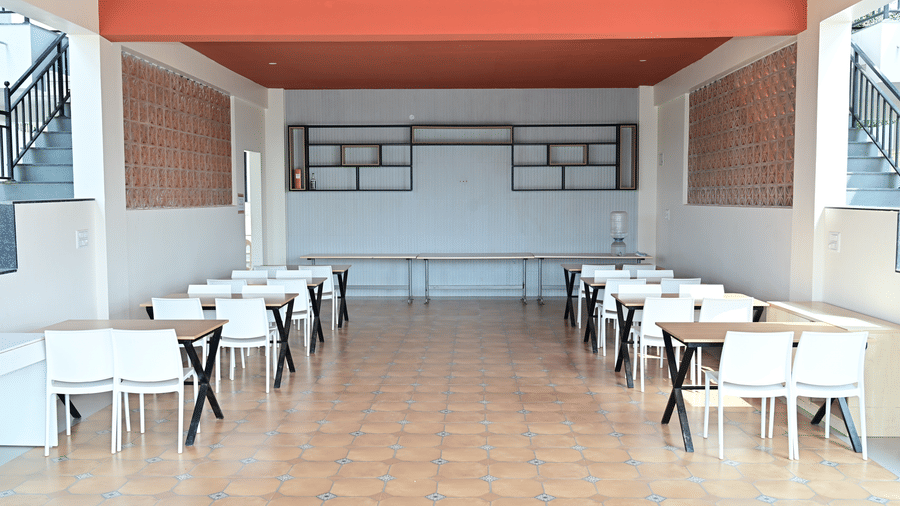 Spacious indoor dining area with neatly arranged tables and chairs for guests.