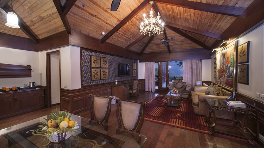the living room area showing a dining table - Mayfair Spa Resort & Casino Gangtok 