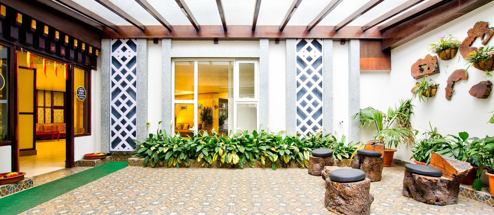 Exterior view with plants at Summit Ttakshang Residency Hotel & Spa, Gangtok