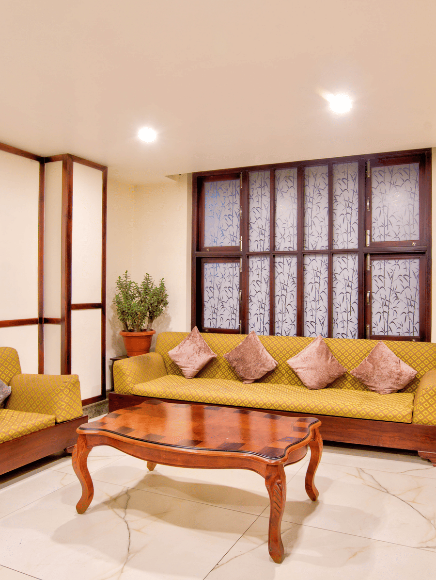 Lobby with spacious and comfortable sofas along with glass table at Summit Ttakshang Residency Hotel & Spa, Gangtok