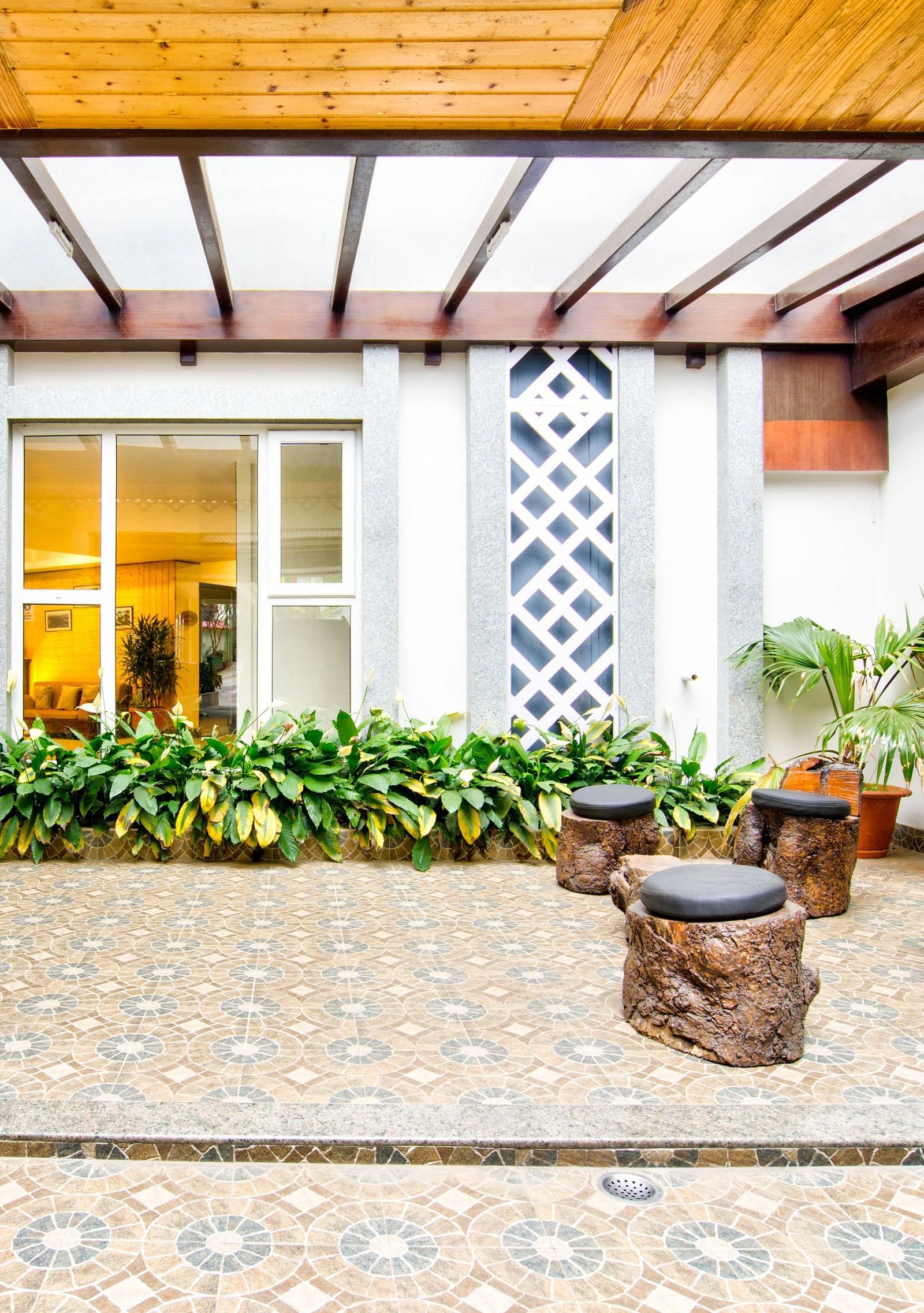 Exterior view with plants at Summit Ttakshang Residency Hotel & Spa, Gangtok