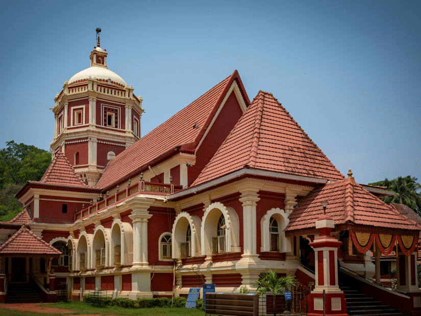 Shantadurga Temple, one of the lesser known places to explore in South Goa, featuring Indo-Portuguese facade on a sunny day