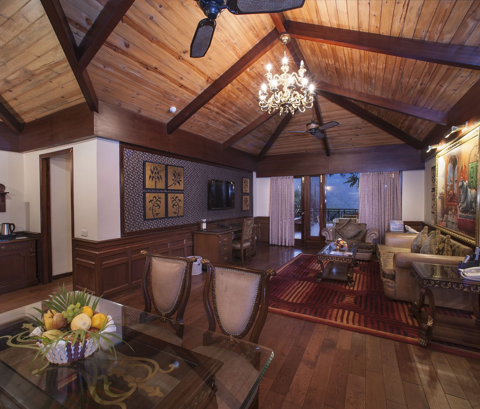 the living room area showing a dining table - Mayfair Spa Resort & Casino Gangtok 