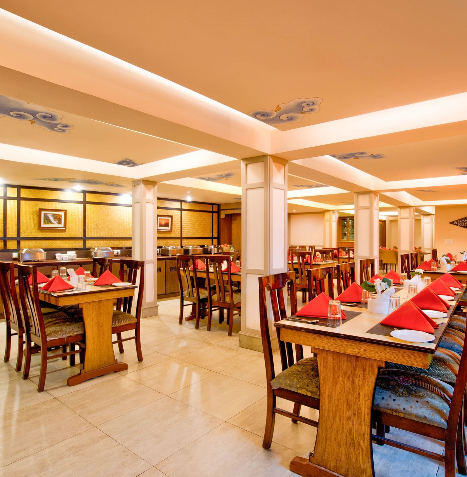 kocktails and kurries restaurant and bar with furniture and cultinary arranged neatly at Summit Ttakshang Residency Hotel & Spa, Gangtok